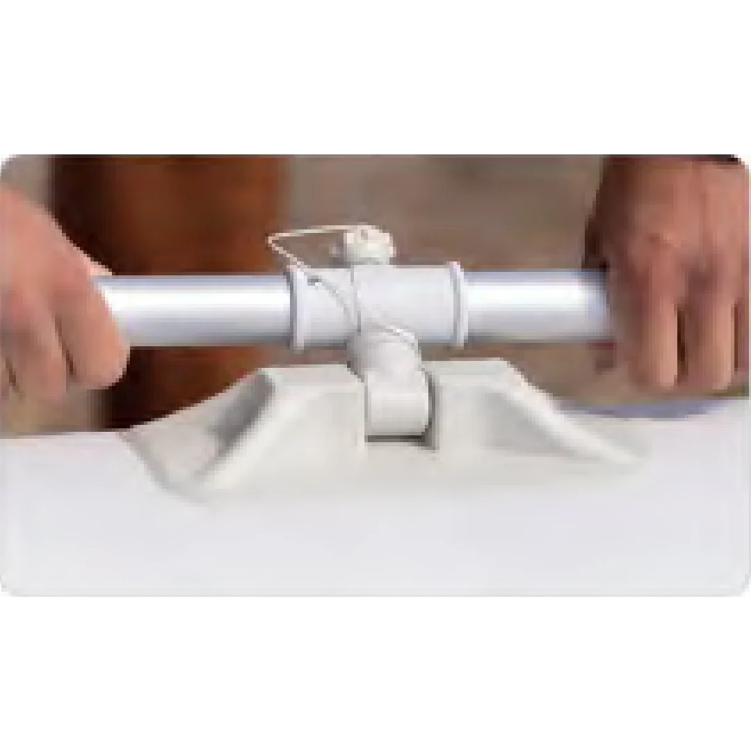 Close-up of hands tightening a white metal latch on a white inflatable Aqua Marina Deluxe Air Deck paddle board