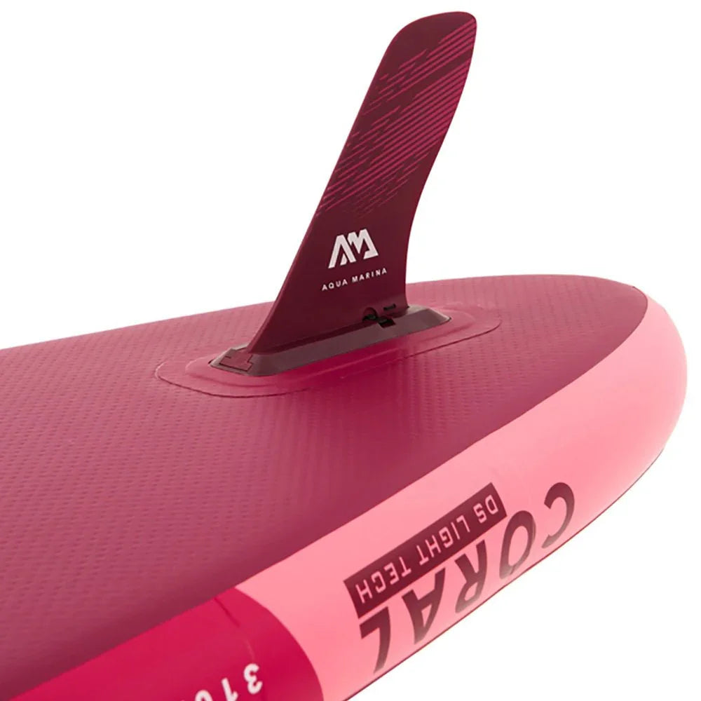 Close-up of Aqua Marina Coral Raspberry inflatable stand-up paddle board fin and tail